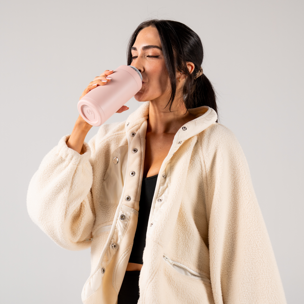 Woman Drinking from Dusty Rose Can Cooler 16oz