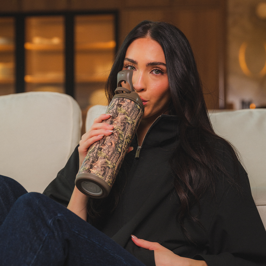 Woman Drinking from 24oz Woodland HydroJug Ease2o