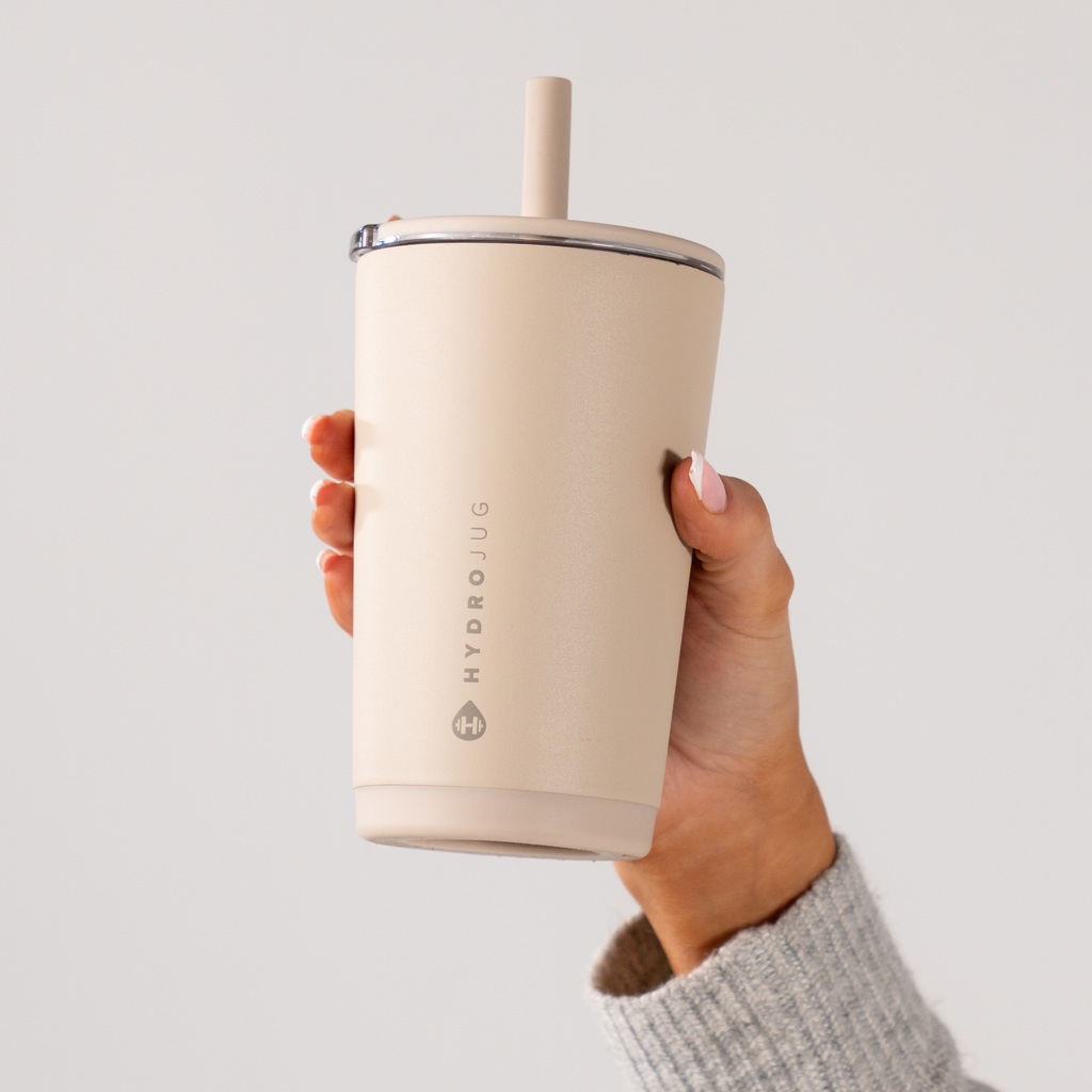 Hand Holding HydroJug Dune Everyday Tumbler 14oz
