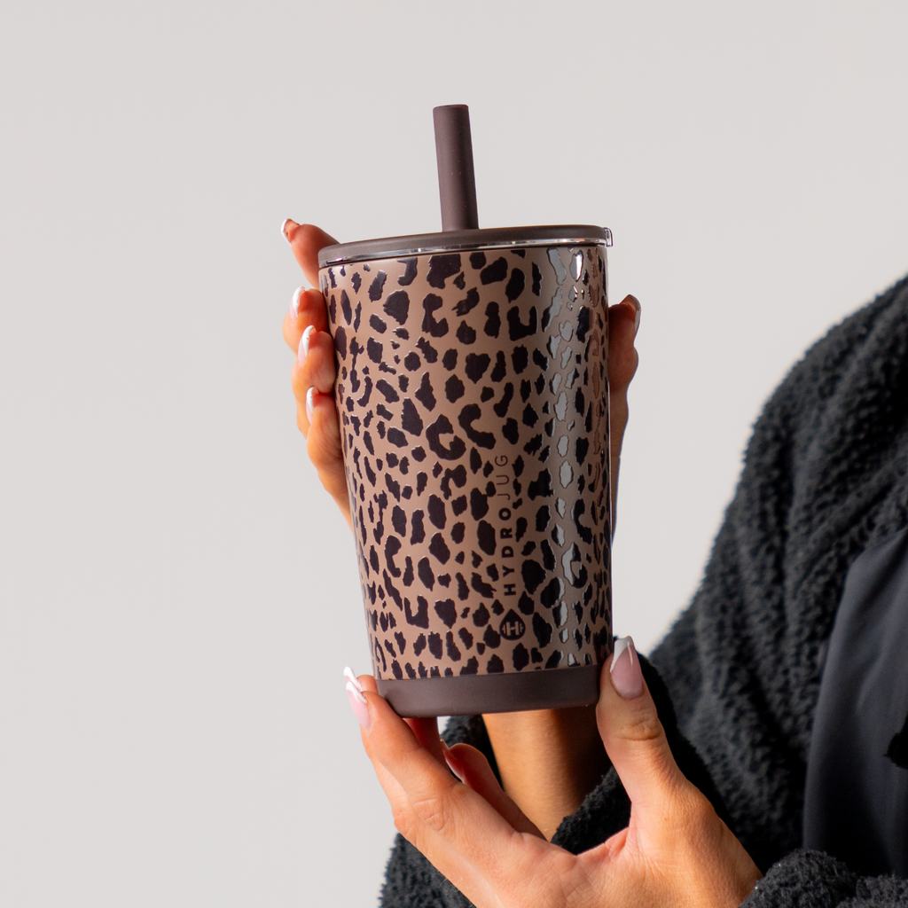Hand Holding HydroJug Brown Leopard Everyday Tumbler 14oz