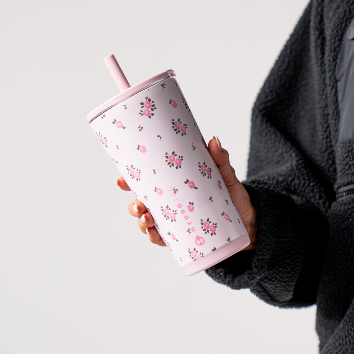 Hand Holding HydroJug Wildrose Everyday Tumbler 20oz